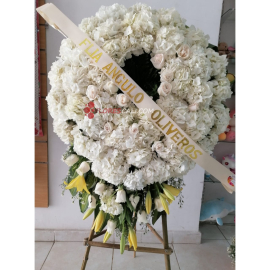 Corona funebre hortensias y lirios en cali