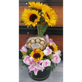 Arreglo alto cilindro de rosas y girasoles en cali