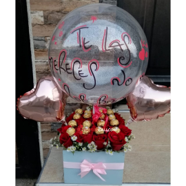 Cubo de rosas con chocolates en cali
